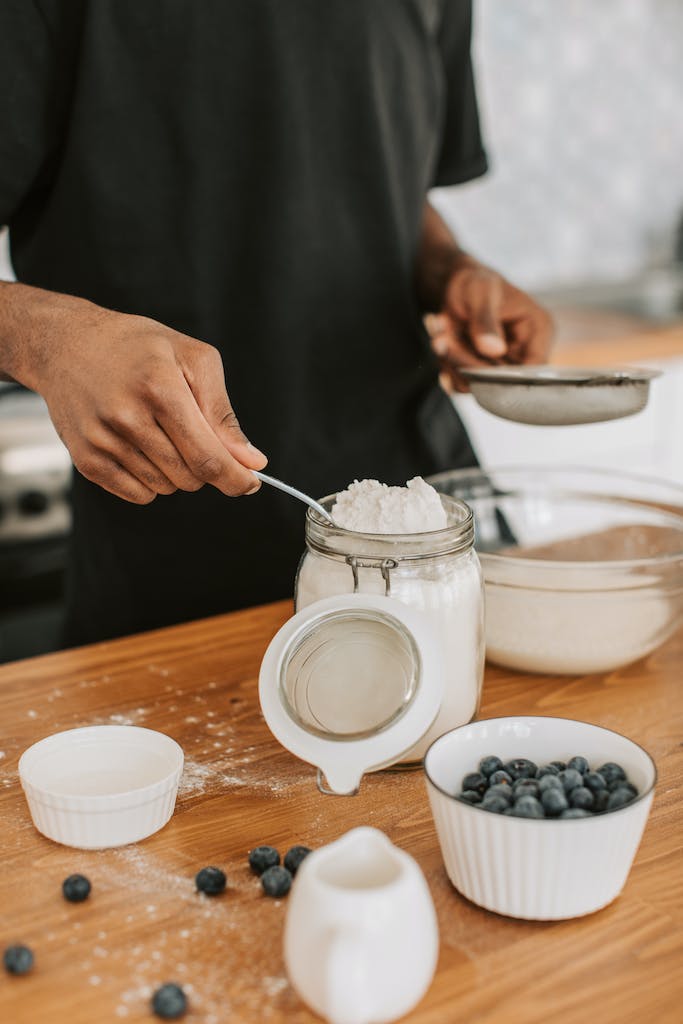 Close-up of a Man Preparing a Pancake Mix